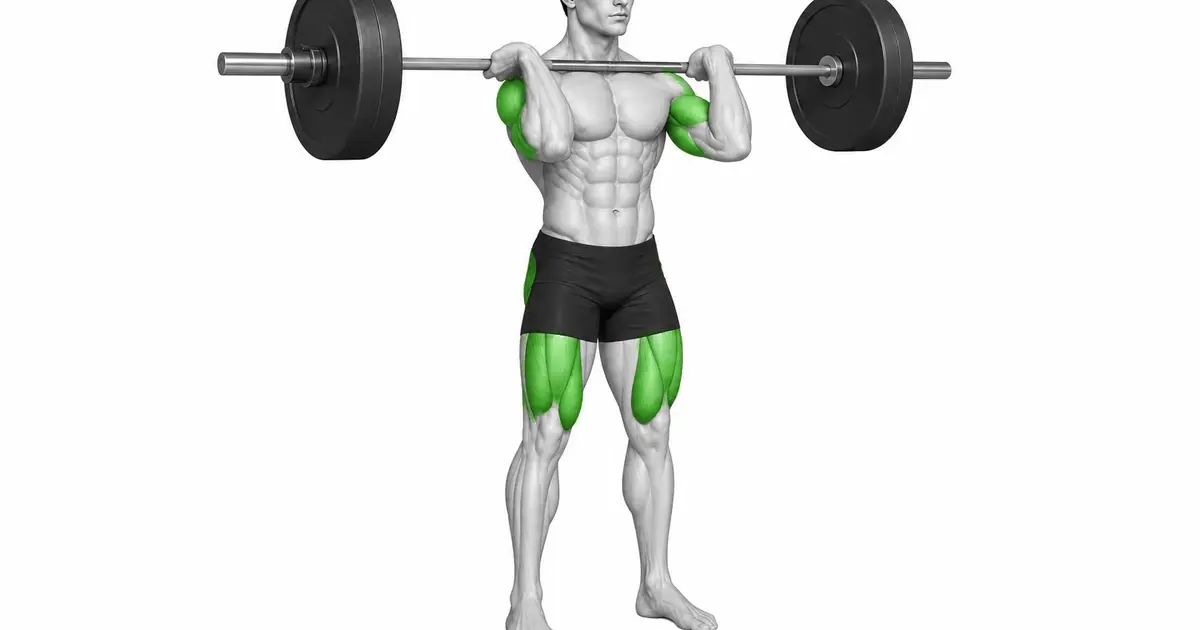 Standing barbell thruster starting position with the barbell on the front rack in front of the shoulders.